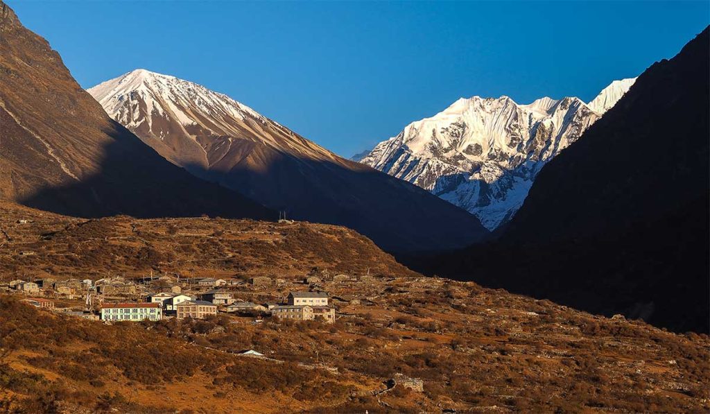 Kyanjin Gompa village in Nepal's Langtang Valley with snow-capped Langtang Lirung and Gangchempo in background