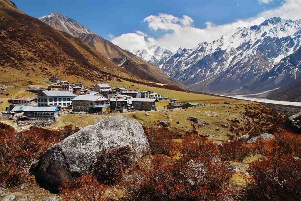 Visible Tserko Ri in the background towering over the Kyanjin Gompa Village.