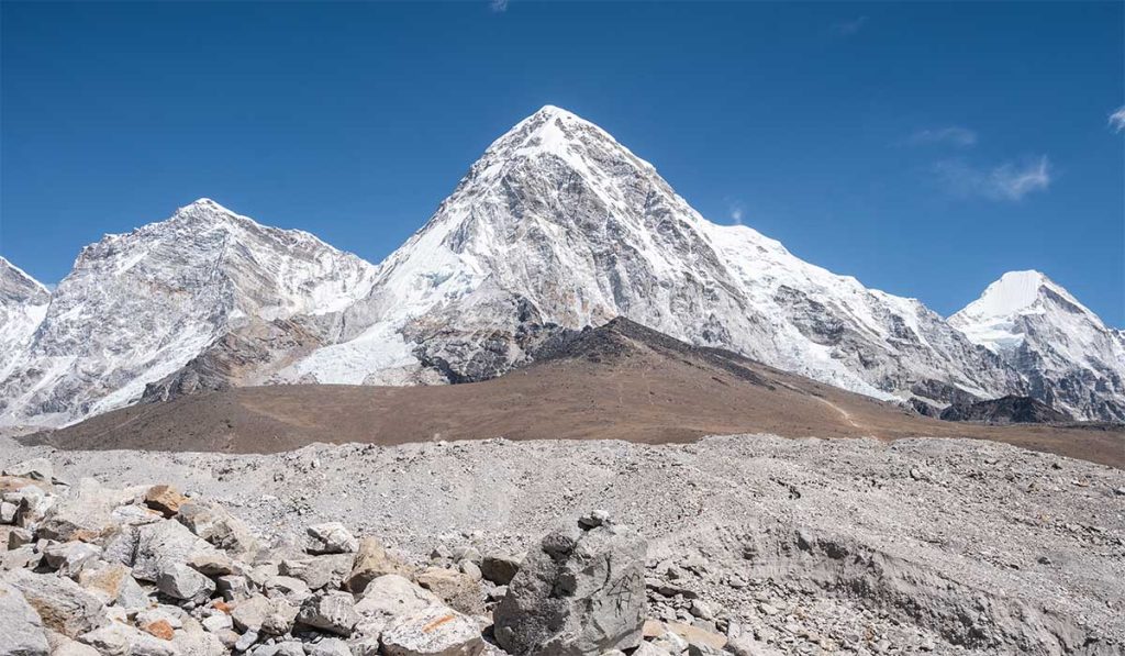 Snow-covered Everest region landscape in December with clear blue skies